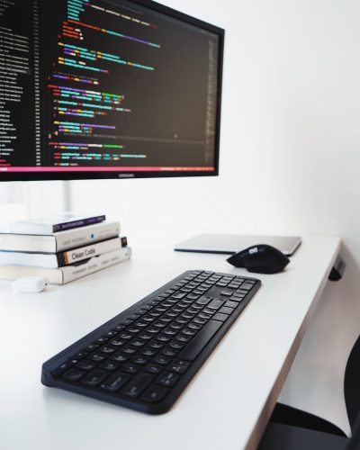 black computer keyboard on white desk